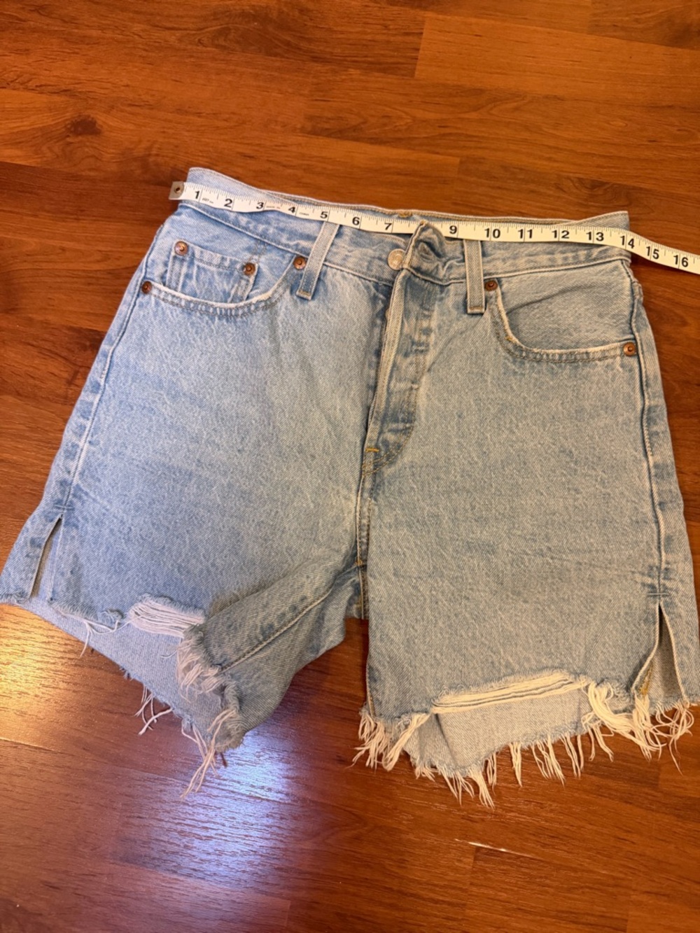Levi's Light Wash Frayed Hem Denim Shorts